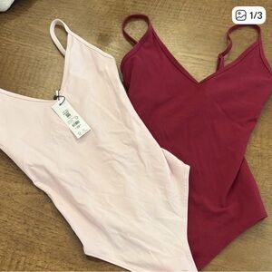 ISO Garage Pink and Red Bodysuits